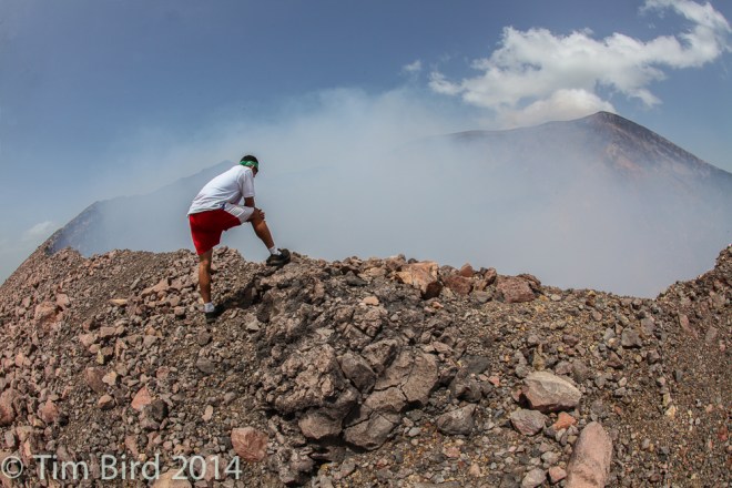 My guide, Jesus, took me to the mountain. Here he is peering in to the smouldering crater of the Telica volcano.